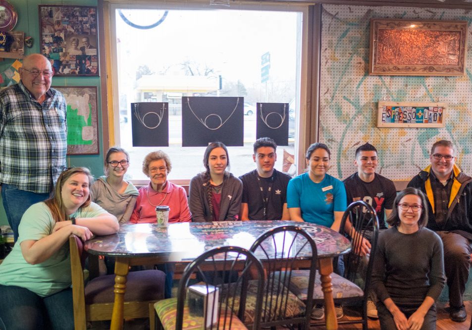 Some of the participants in Senior Spotlight, back row, from left: Coombs Hall, Lindsey McFarlane, Gladys May, Daniela Mendez, Roman Medina, Maribel Escalante, Freddy Escalante, and teacher Craig Gowans. Front: Maria Sykes (Epicenter Director) and Jamie Horter (Frontier Fellow). Not pictured: student Marcela Soto and interviewed seniors Dean and Hilda King, Ardon and Carolyn Sherril, and Catherine Kane